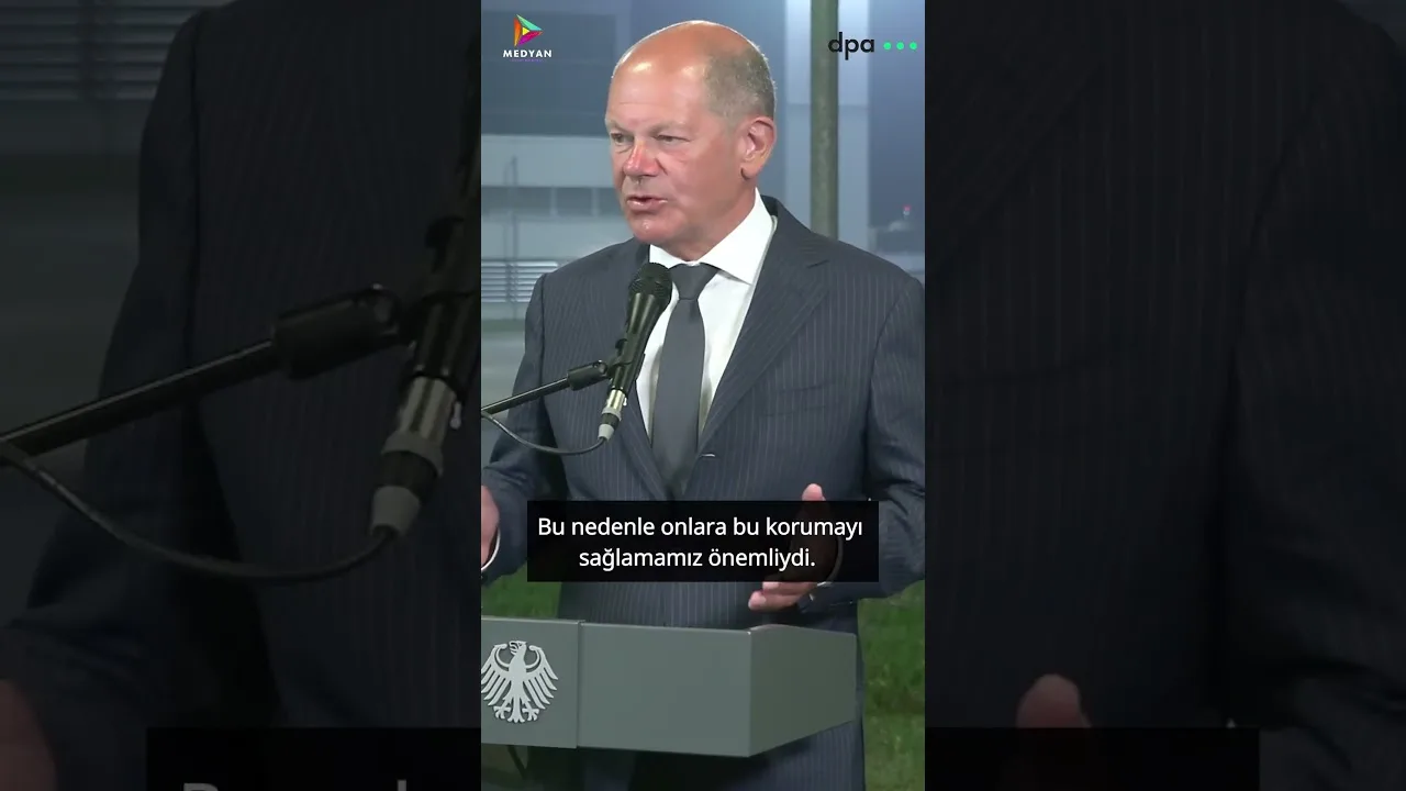 ALMANYA RUSYA REHİNE TAKASI SCHOLZ KONUŞTU
